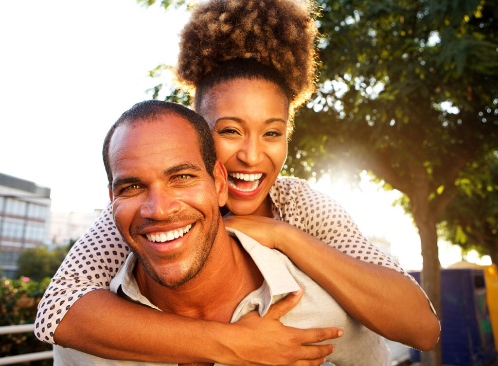 man and woman happy together